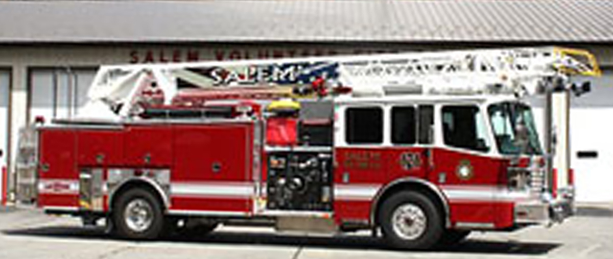 Ladder Truck 121 passenger's side view